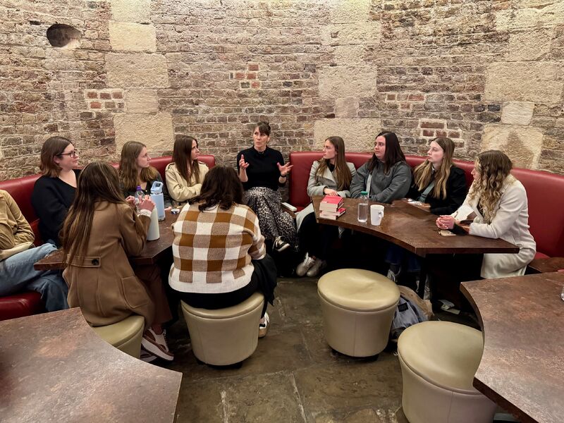 Suzy talking to students